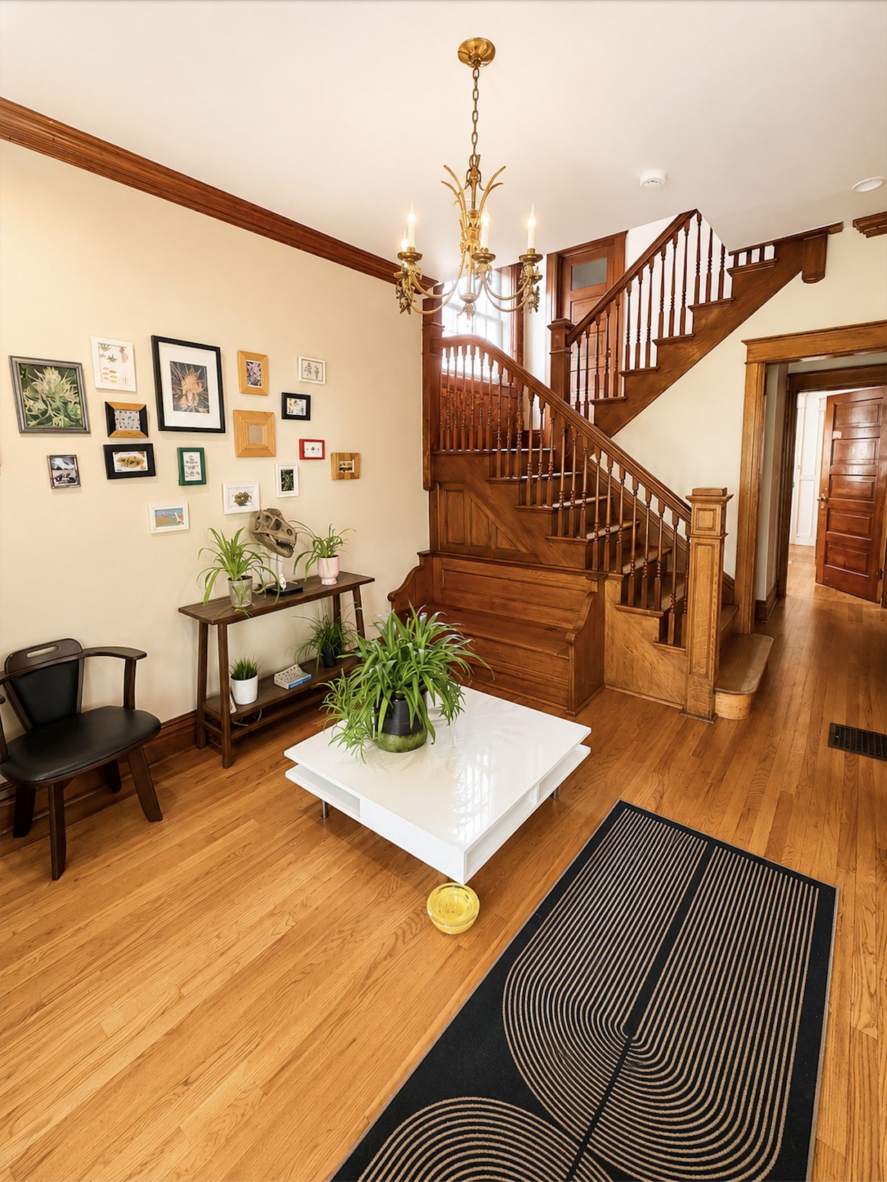 Historic staircase with gallery wall